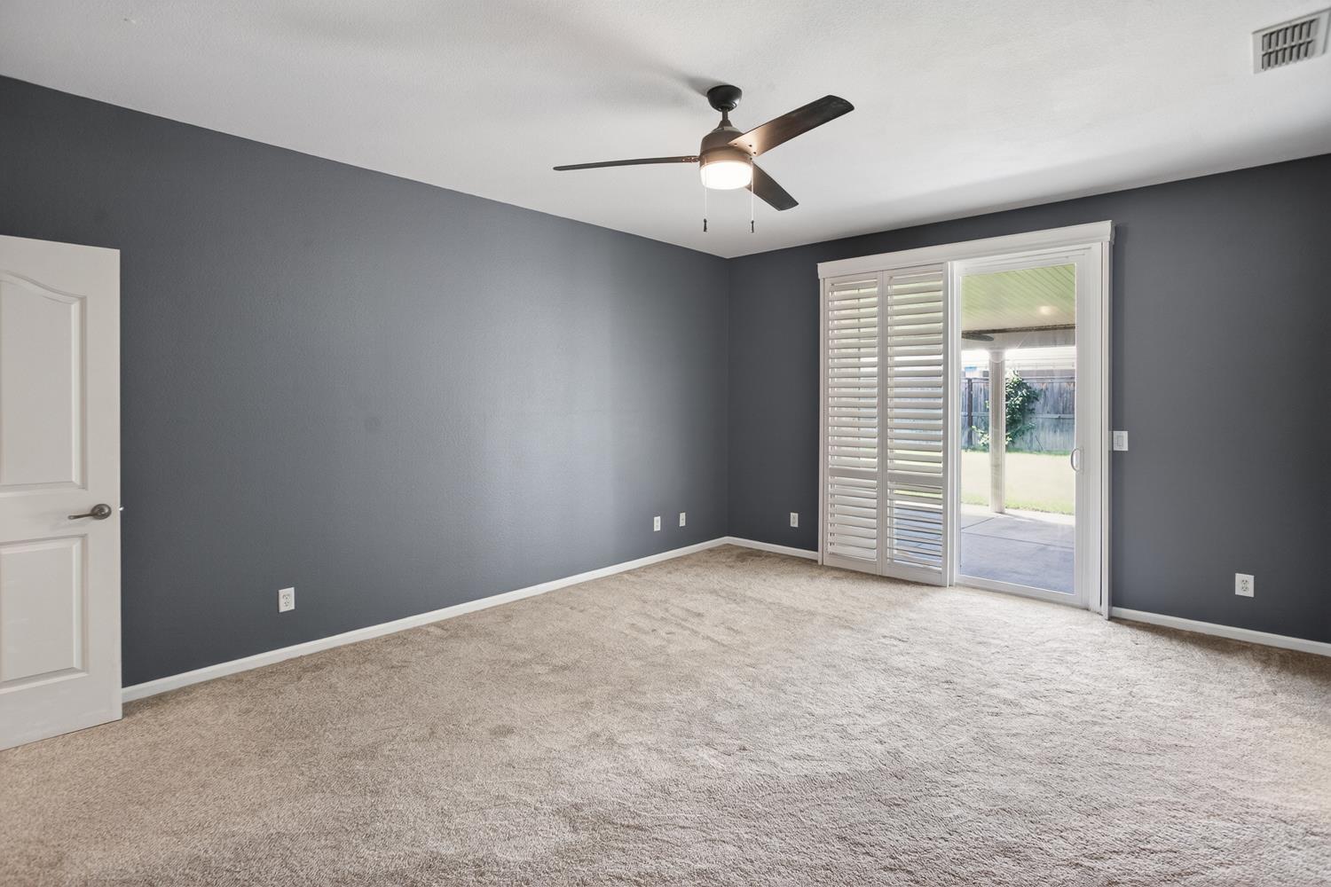 2042 Danforth Way Plumas Lake, CA 95961 - Photo 44 of 56 an empty room with windows and fan
