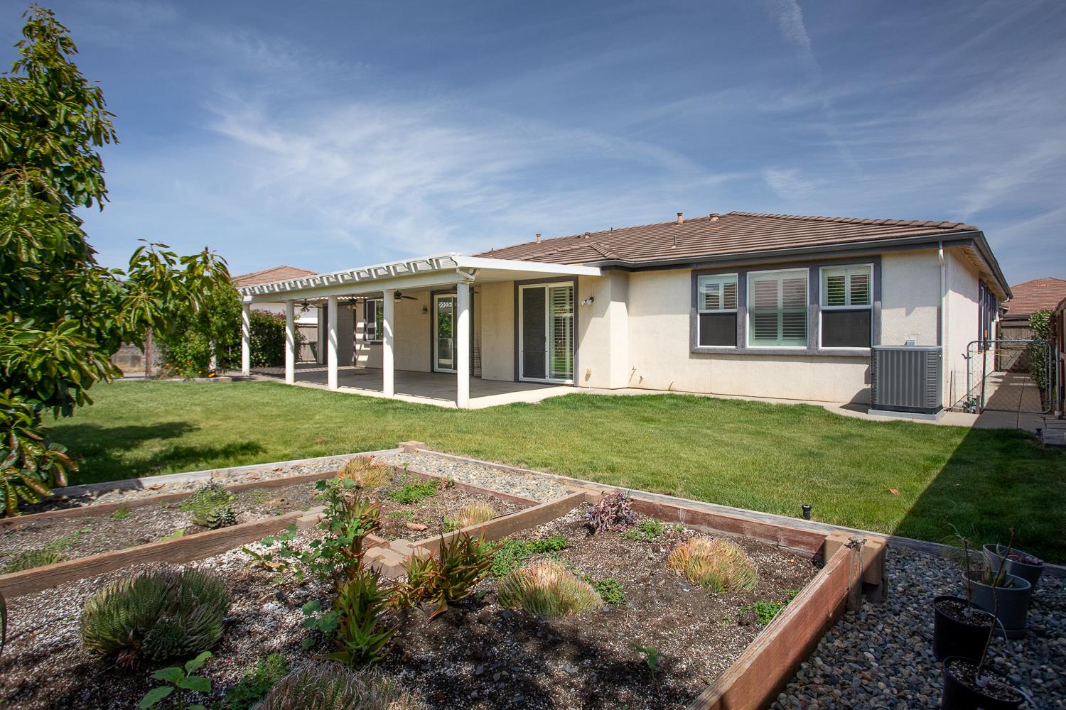 2042 Danforth Way Plumas Lake, CA 95961 - Photo 47 of 56 front view of a house with a yard