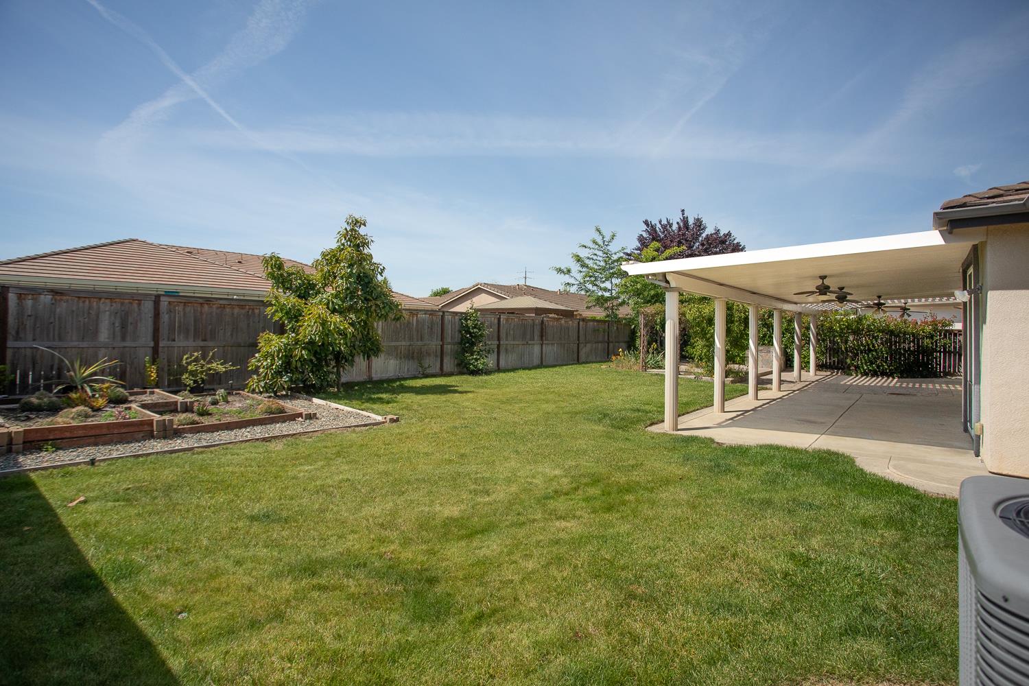 2042 Danforth Way Plumas Lake, CA 95961 - Photo 48 of 56 a view of a house with backyard patio and swimming pool