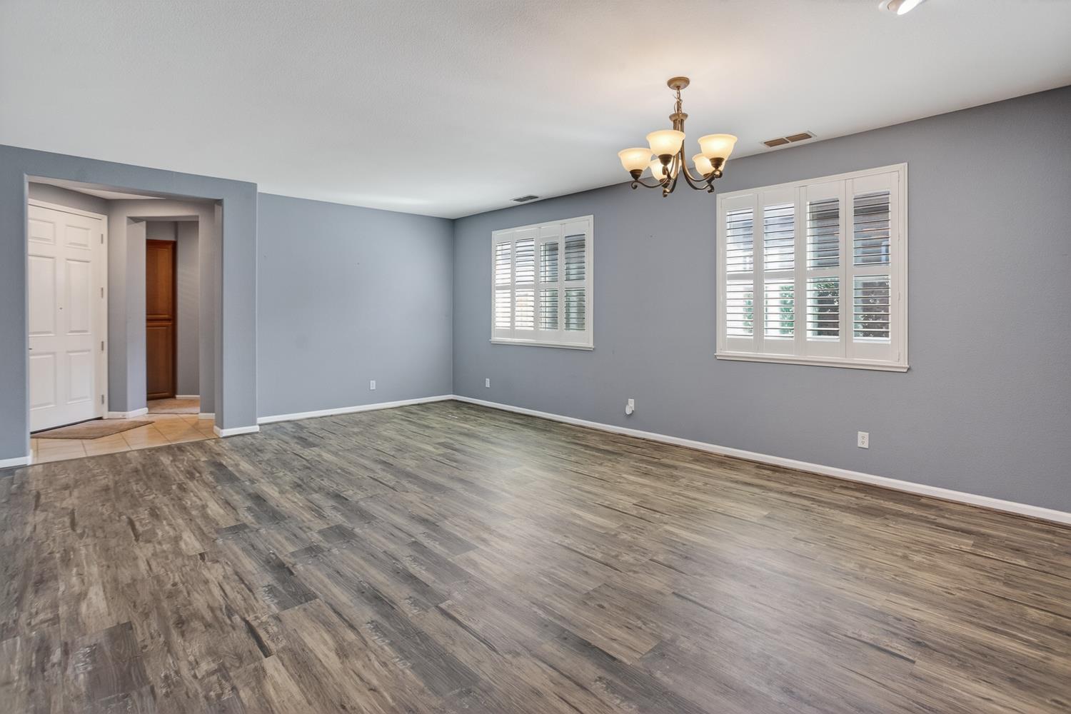 2042 Danforth Way Plumas Lake, CA 95961 - Photo 5 of 56 a view of empty room with wooden floor and fan