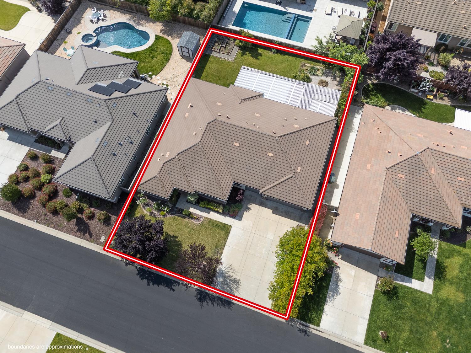 2042 Danforth Way Plumas Lake, CA 95961 - Photo 55 of 56 an aerial view of a house with a garden and plants