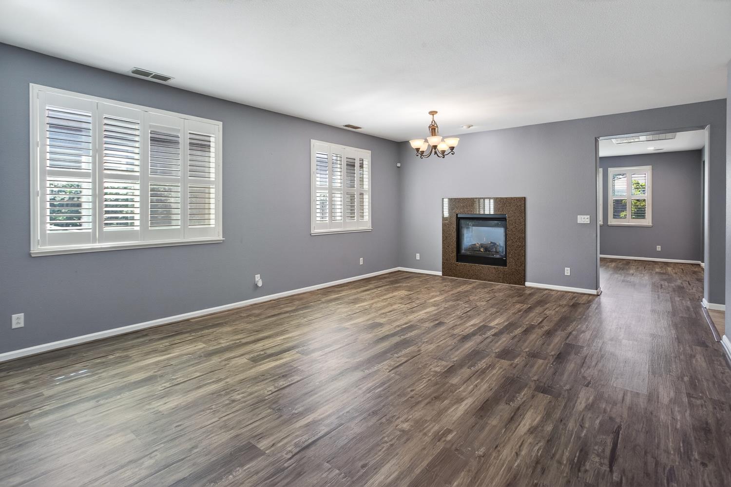 2042 Danforth Way Plumas Lake, CA 95961 - Photo 6 of 56 a view of empty room with wooden floor and fan