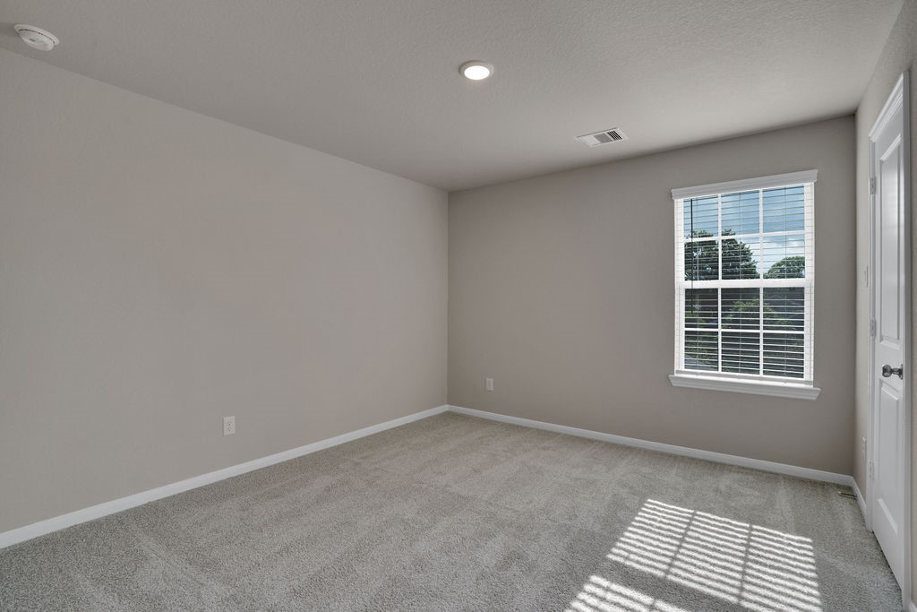 2012 Bellview Street Texas City, TX 77568 - Photo 12 of 23 an empty room with windows