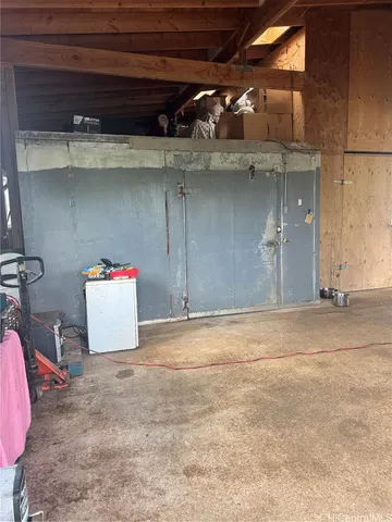 a front view of a house with outdoor seating