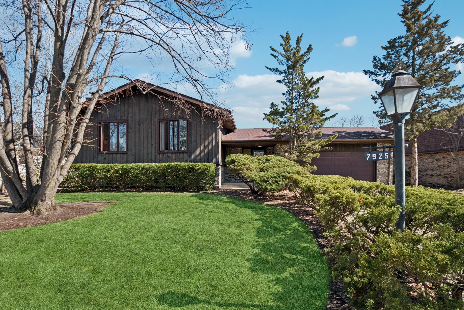 7925 Glen Lane Darien, IL 60561 - Photo 1 of 25 a front view of a house with a yard
