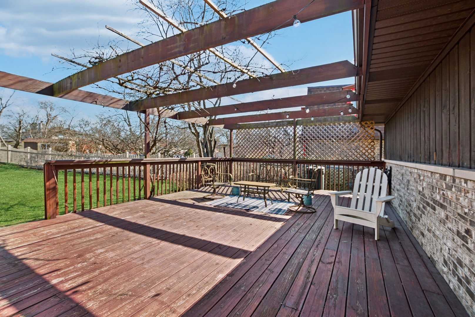 7925 Glen Lane Darien, IL 60561 - Photo 5 of 25 a view of balcony with wooden floor and outdoor seating