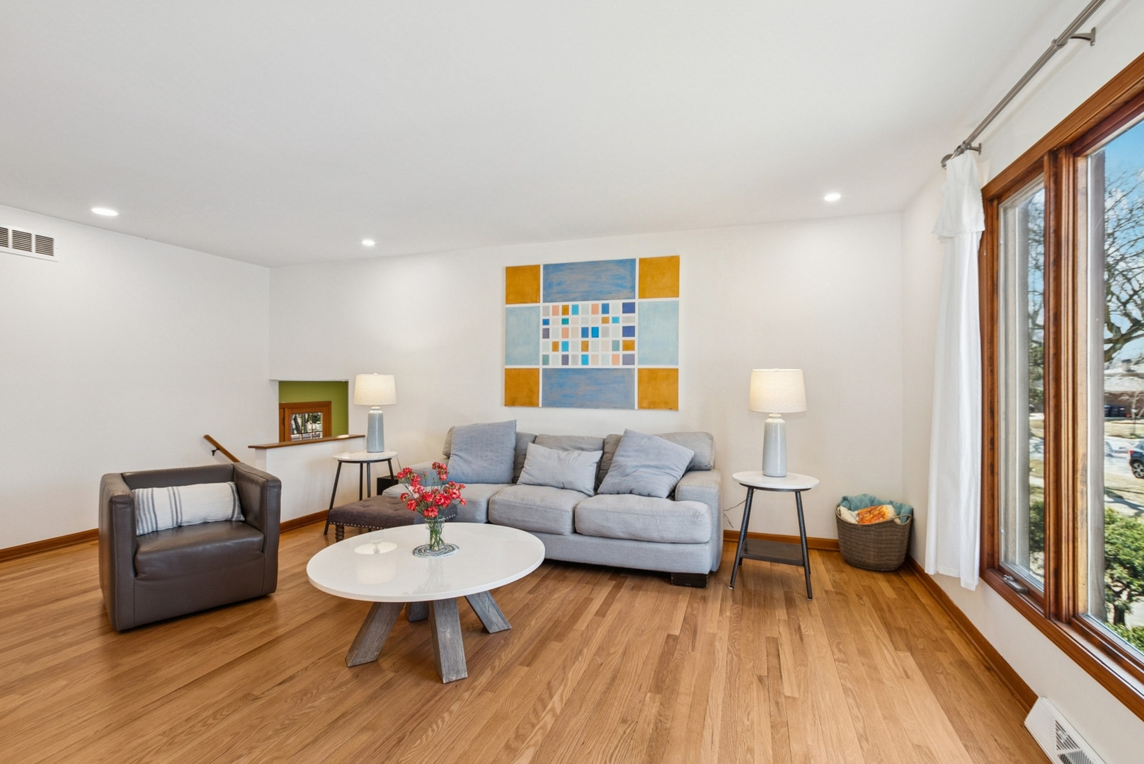 7925 Glen Lane Darien, IL 60561 - Photo 10 of 25 a living room with furniture and a wooden floor