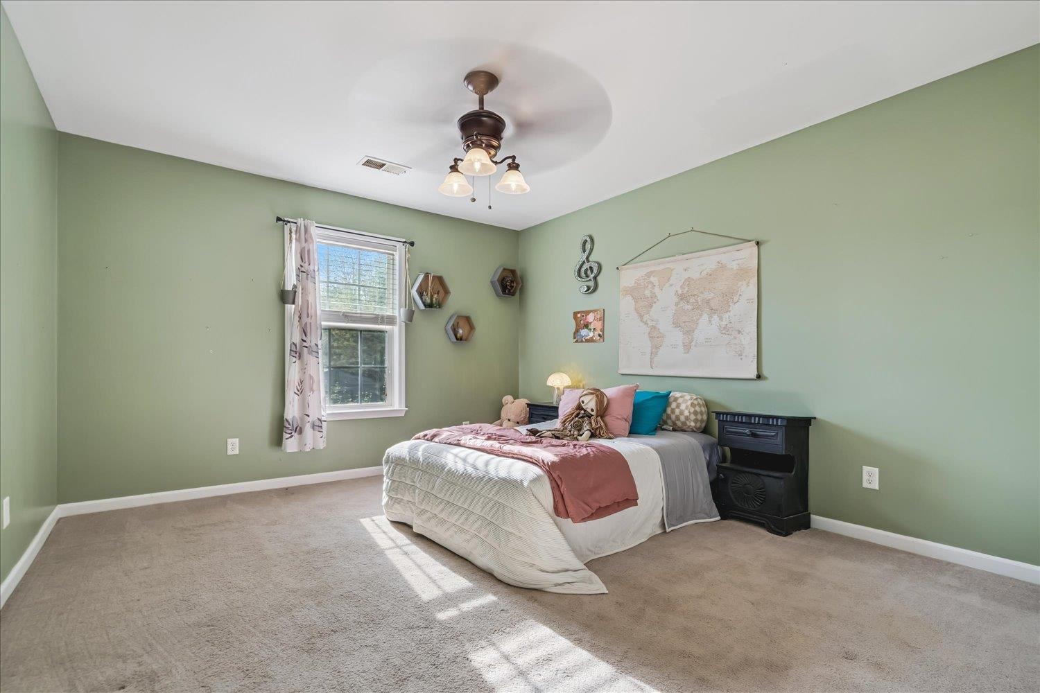 134 Rembert Drive Atoka, TN 38004 - Photo 16 of 28 a spacious bedroom with a bed and a window