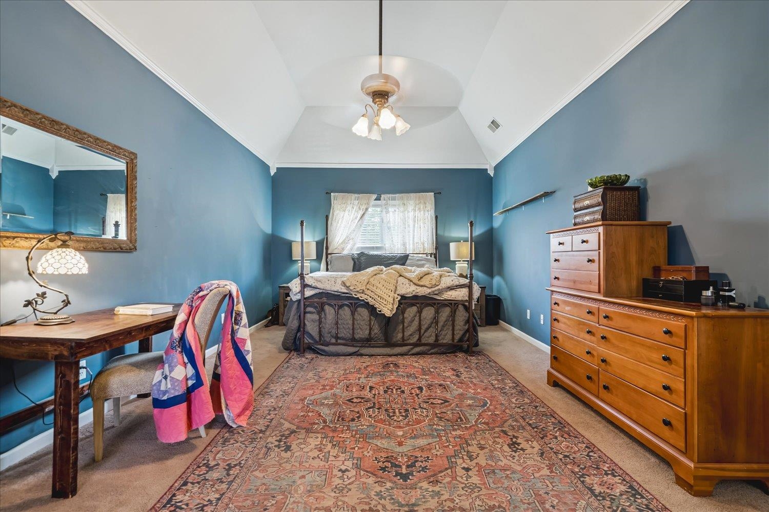 134 Rembert Drive Atoka, TN 38004 - Photo 23 of 28 a bedroom with furniture and a chandelier