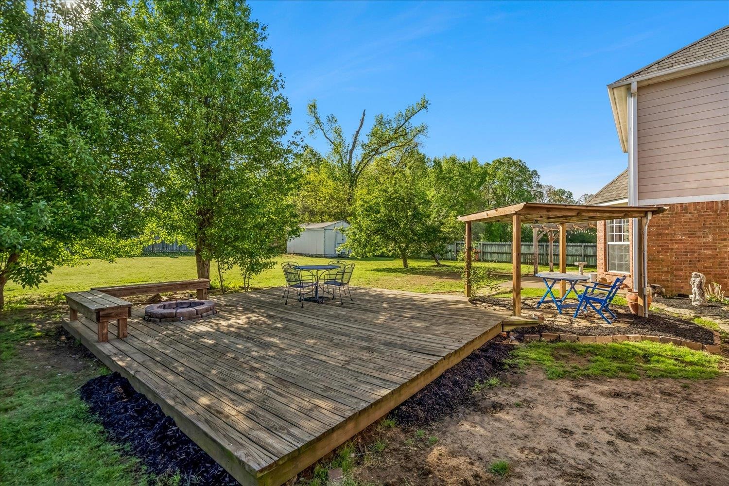 134 Rembert Drive Atoka, TN 38004 - Photo 25 of 28 a view of a backyard with sitting area