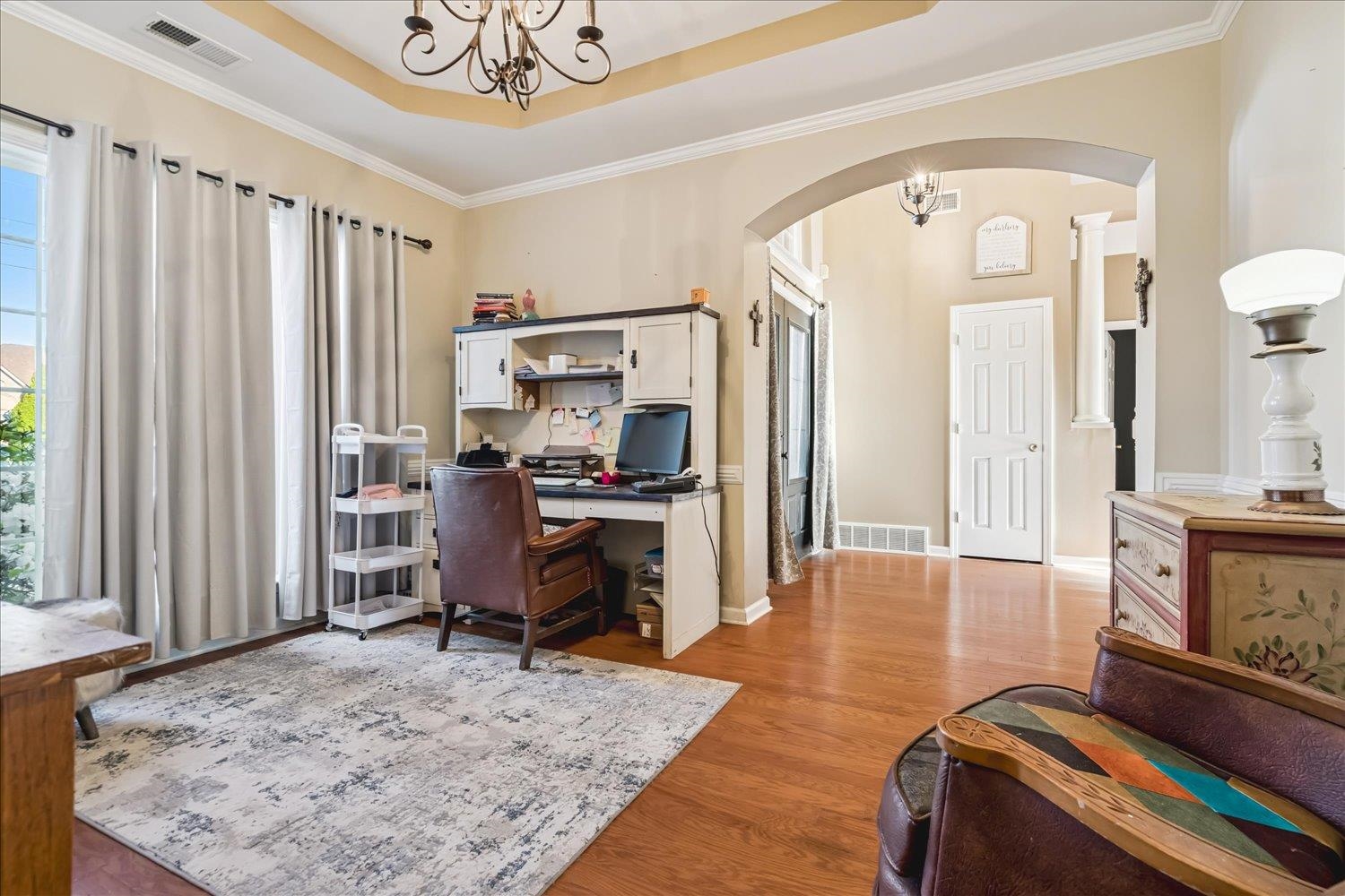134 Rembert Drive Atoka, TN 38004 - Photo 8 of 28 a living room with furniture rug and a window
