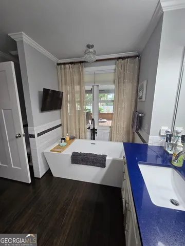 a bedroom with a bed and furniture