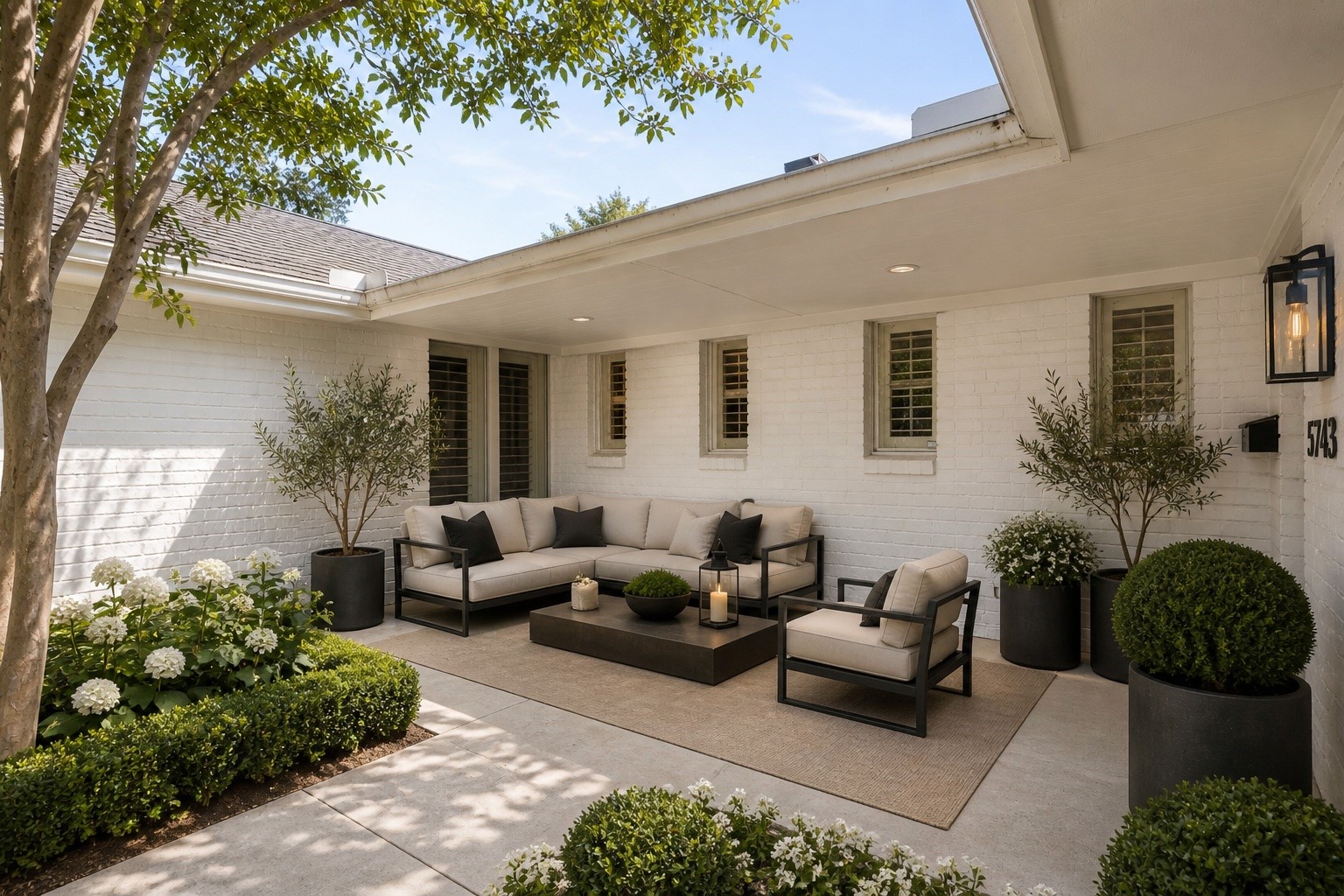 5743 Jason Street Houston, TX 77096 - Photo 3 of 26 Virtually staged Fron Courtyard with just paint, landscaping, and furniture.