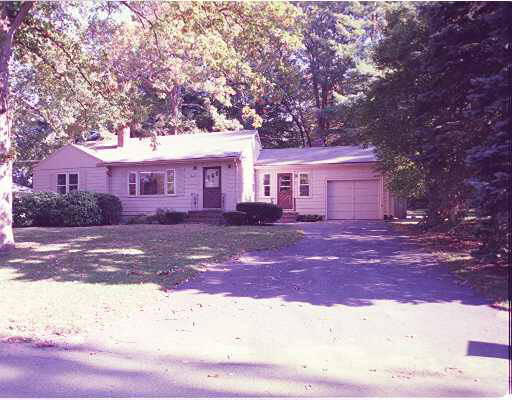 19 Brooksweld Road Canton, MA 02021 - Photo 1 of 1 a front view of a house with a yard and garage