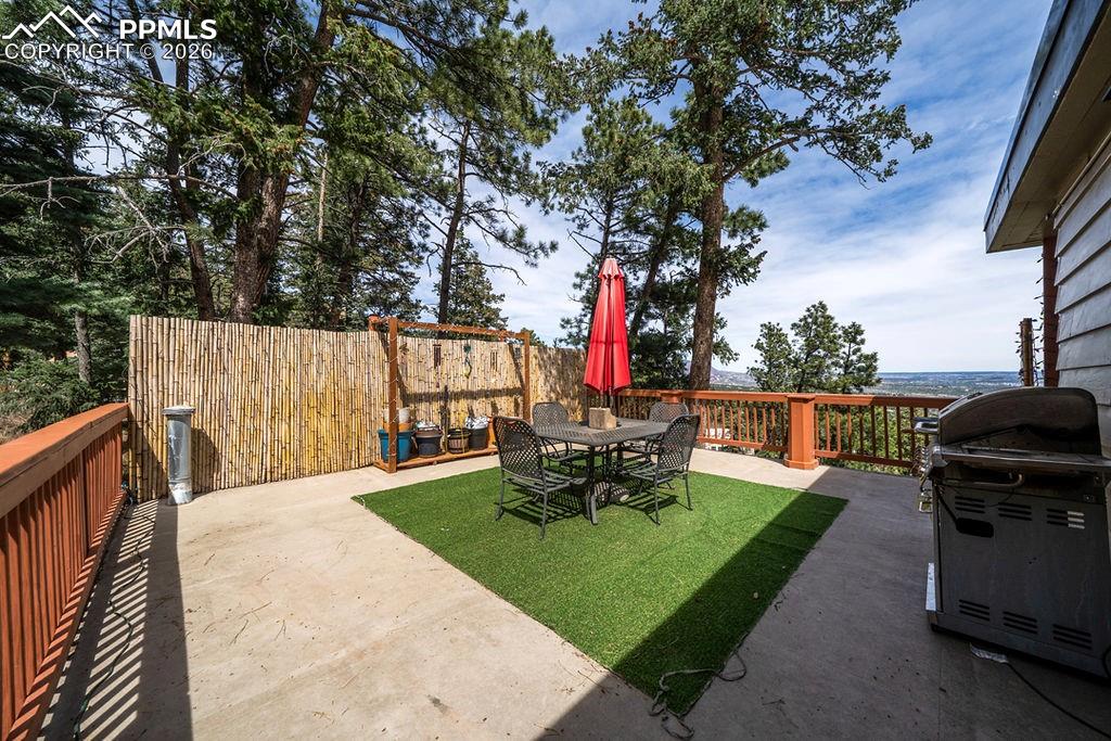 3785 Overlook Road Colorado Springs, CO 80906 - Photo 4 of 45 a view of a table and chairs in the patio