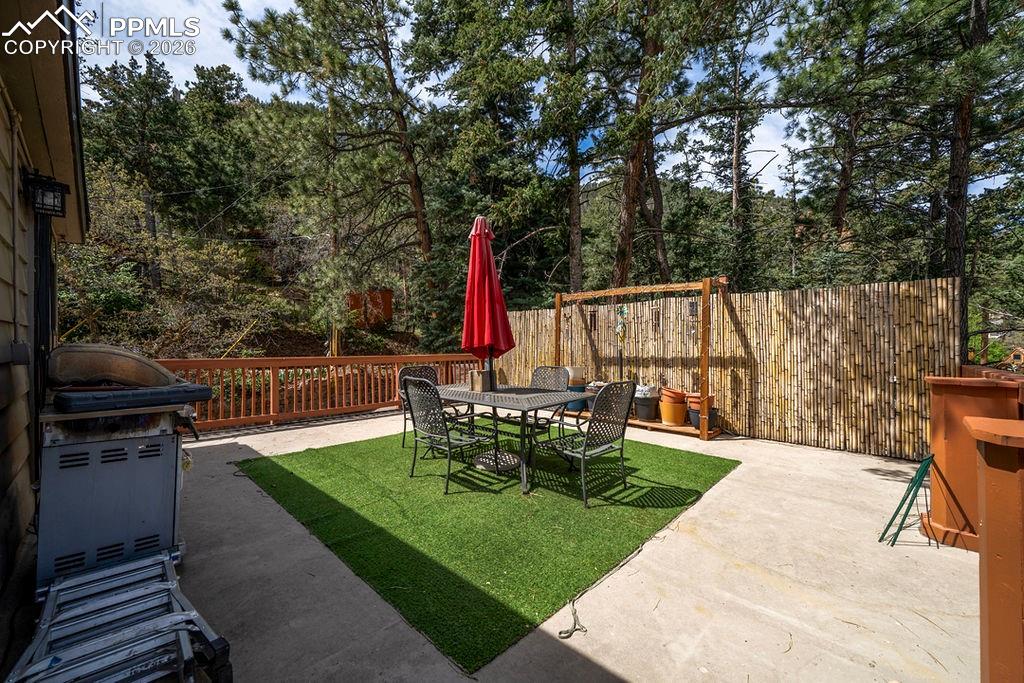 3785 Overlook Road Colorado Springs, CO 80906 - Photo 7 of 45 a view of a sitting area with a table and chairs