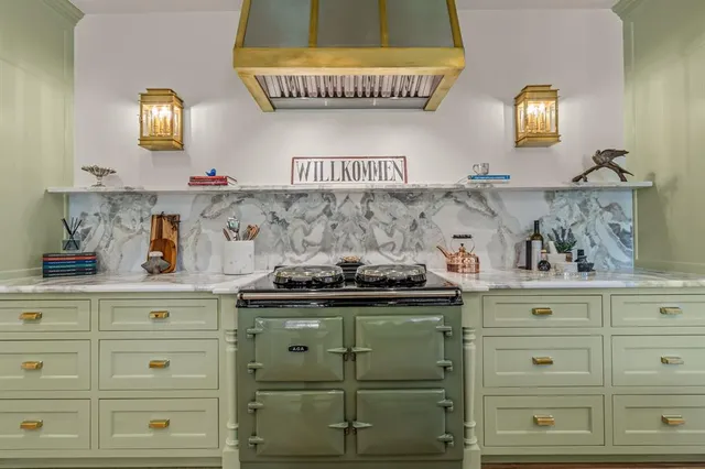 a kitchen with cabinets and a wooden floor