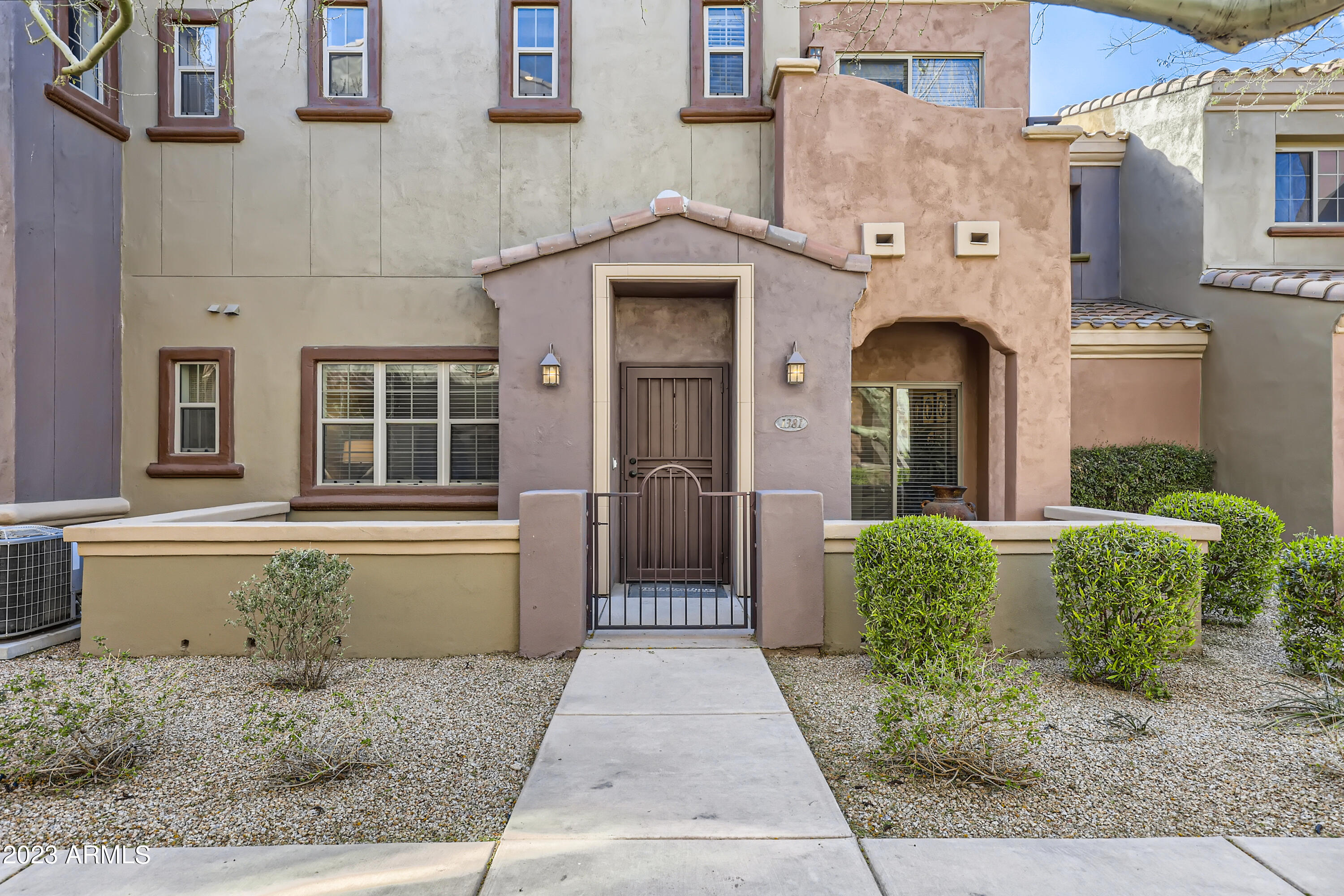 3935 East Rough Rider Road, Unit 1381 Phoenix, AZ 85050 - Photo 2 of 57 01 Exterior Front (2)