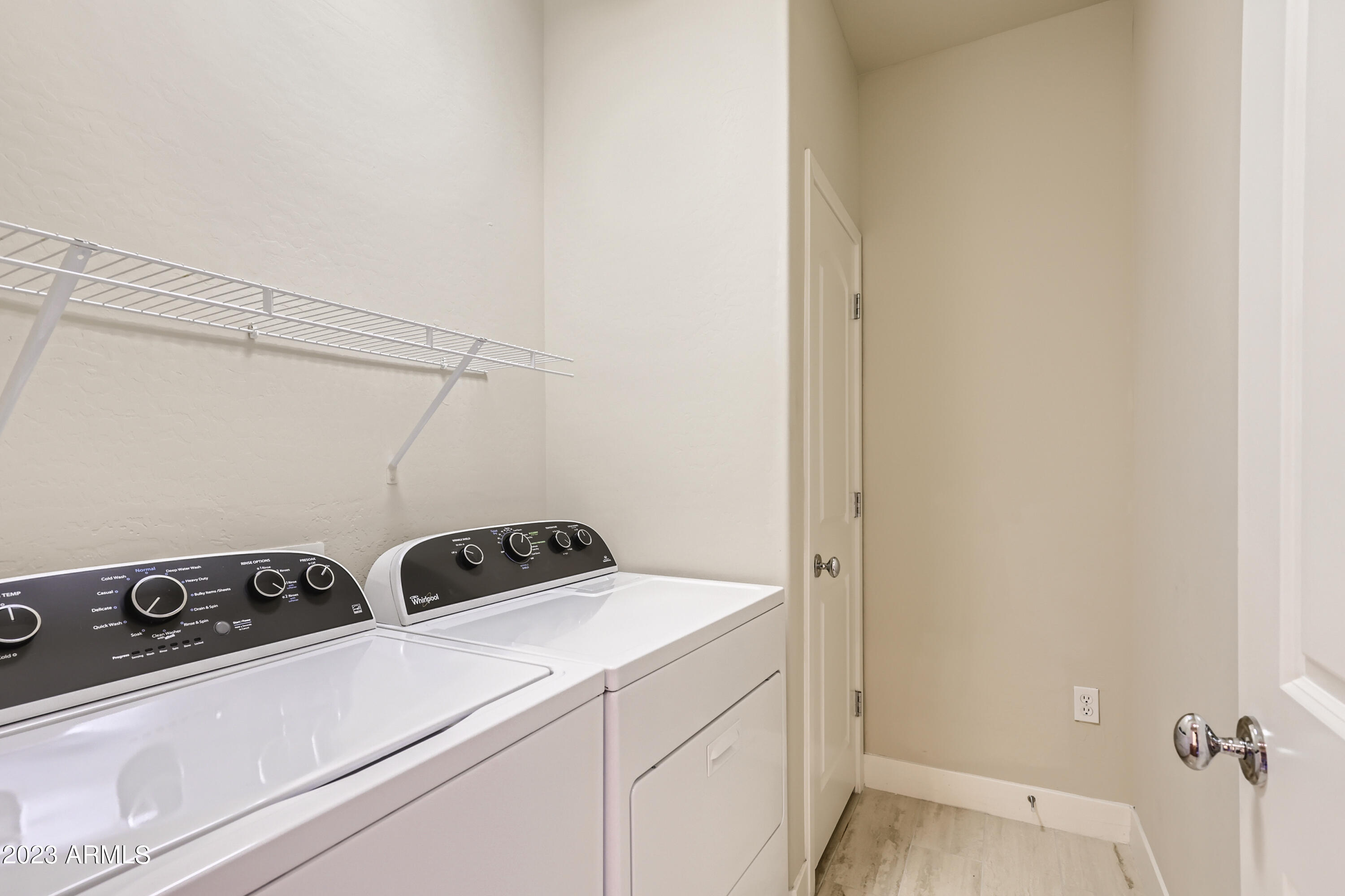 3935 East Rough Rider Road, Unit 1381 Phoenix, AZ 85050 - Photo 26 of 57 38 2nd Floor Laundry Room