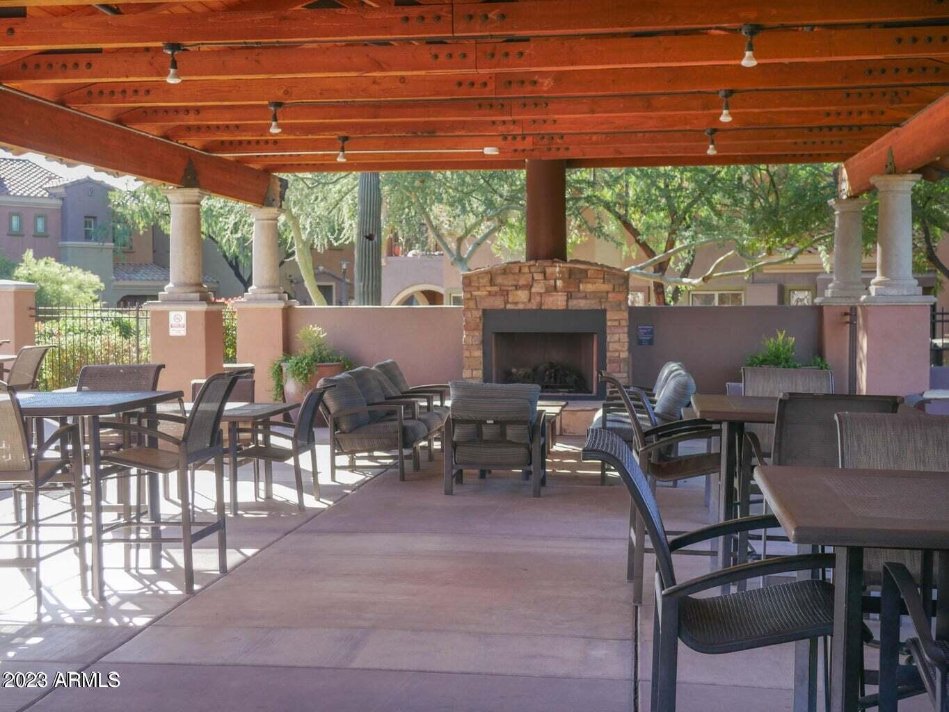 3935 East Rough Rider Road, Unit 1381 Phoenix, AZ 85050 - Photo 42 of 57 Fireplace outdoor
