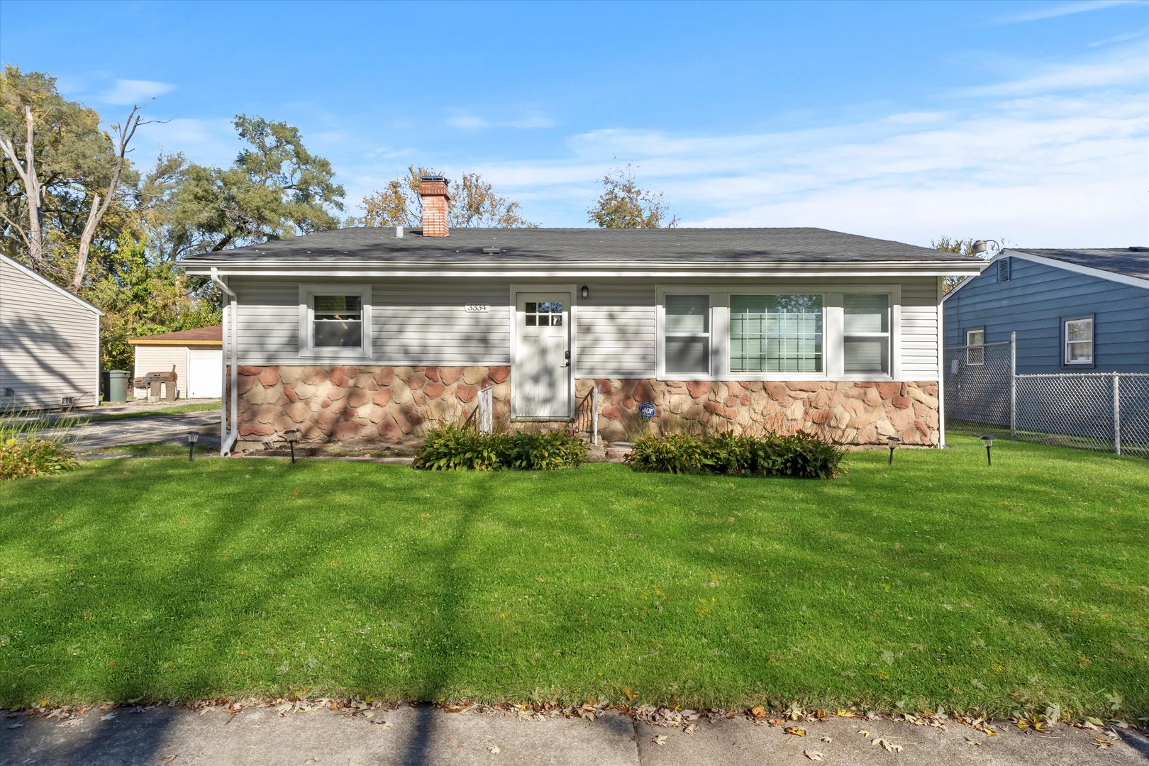 front view of house with a yard