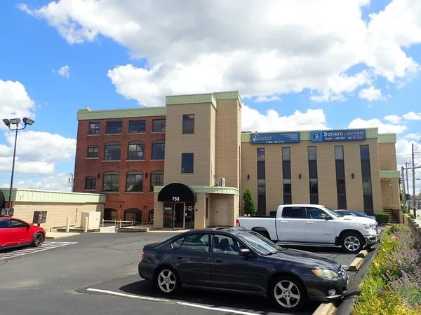 a car parked in front of a house