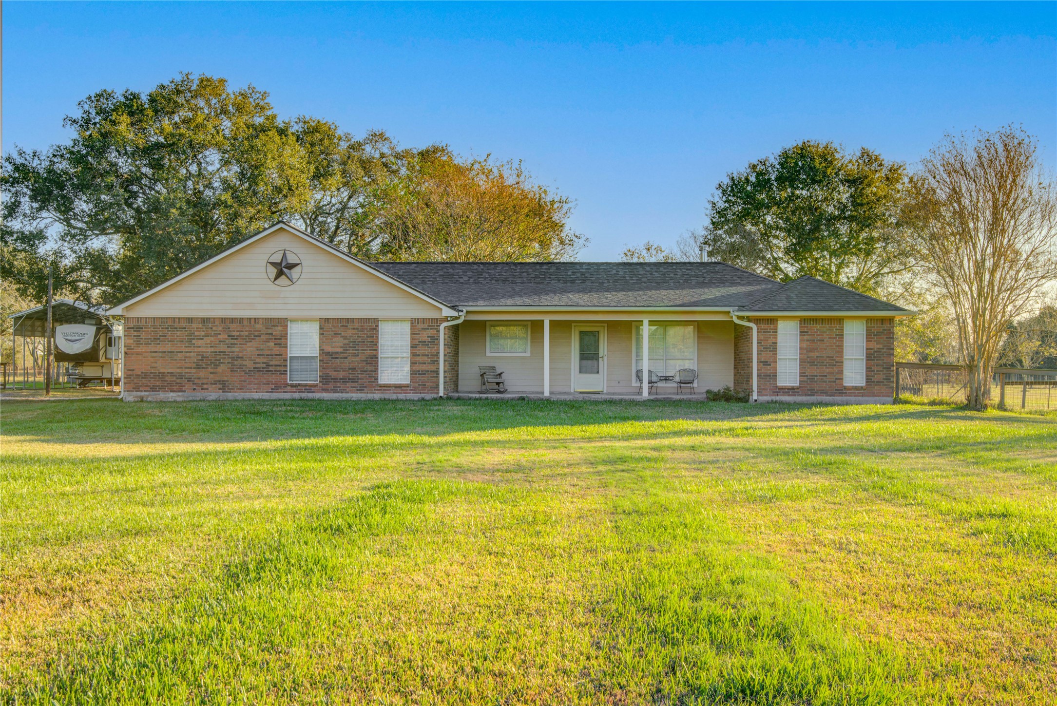 21503 Pecan Bend Road Damon, TX 77430 - Photo 2 of 39 a view of a house with a swimming pool