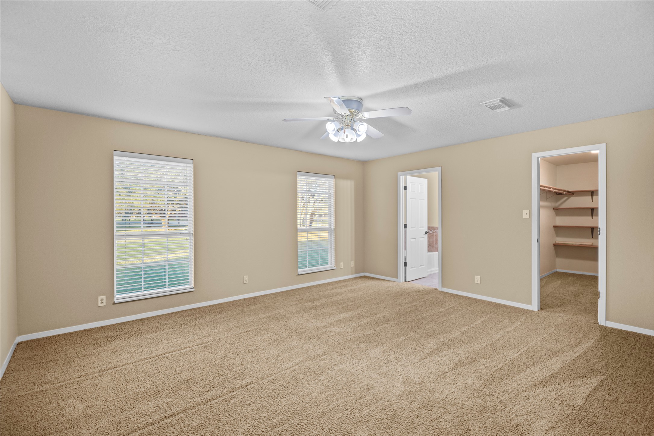 21503 Pecan Bend Road Damon, TX 77430 - Photo 21 of 39 a view of an empty room with a window