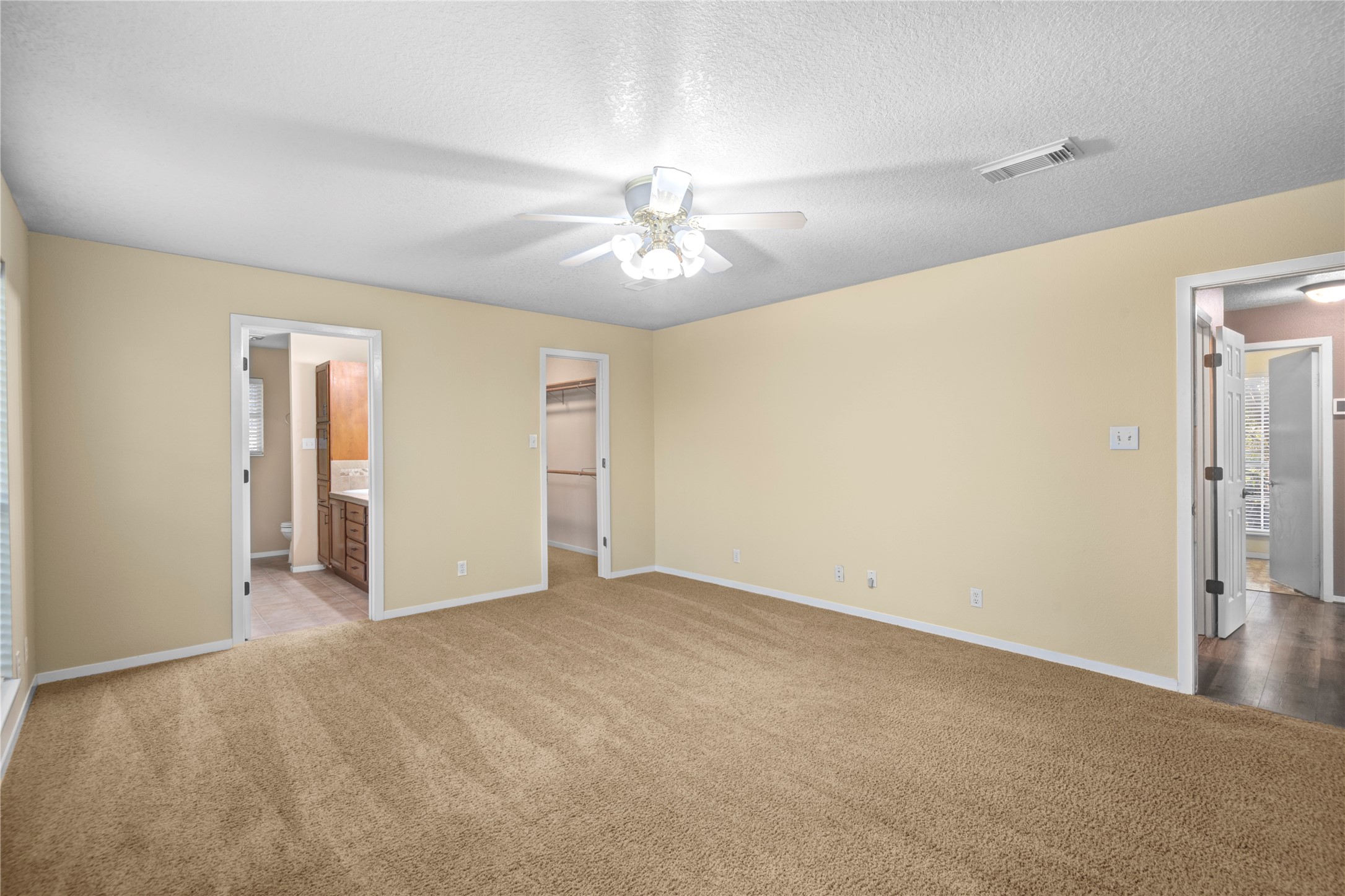 21503 Pecan Bend Road Damon, TX 77430 - Photo 22 of 39 a view of empty room with a ceiling fan