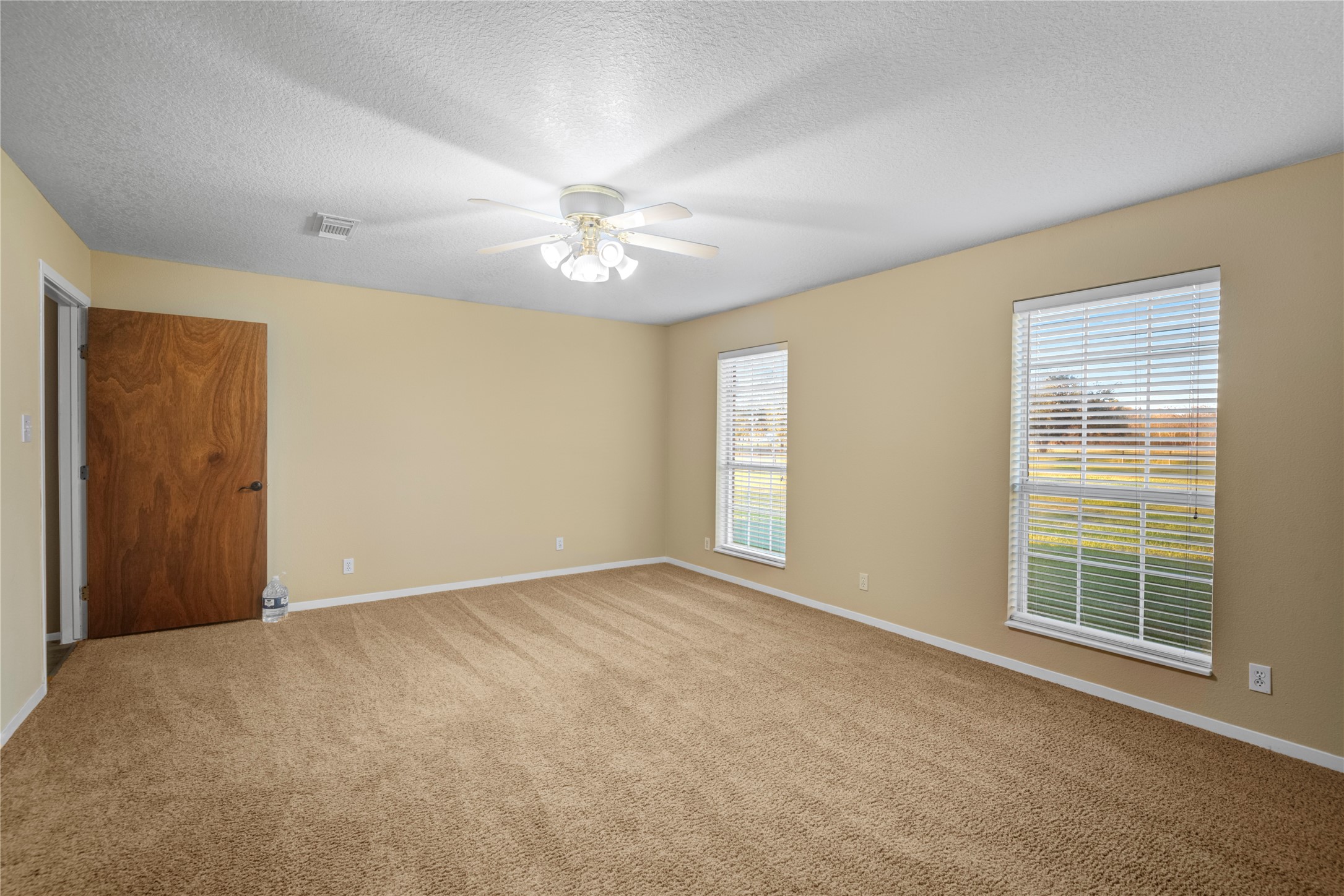 21503 Pecan Bend Road Damon, TX 77430 - Photo 23 of 39 a view of an empty room with a window