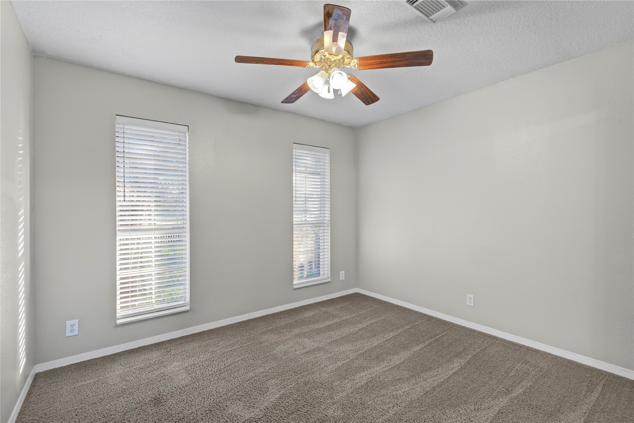 21503 Pecan Bend Road Damon, TX 77430 - Photo 33 of 39 a view of an empty room with a window