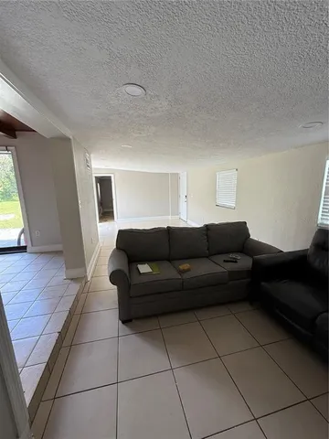 a living room with a couch and a coffee table