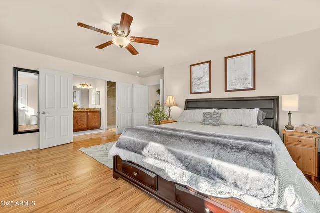 a kitchen with a sink and a mirror