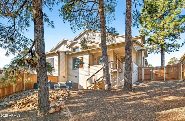 a living room with granite countertop furniture and a fireplace