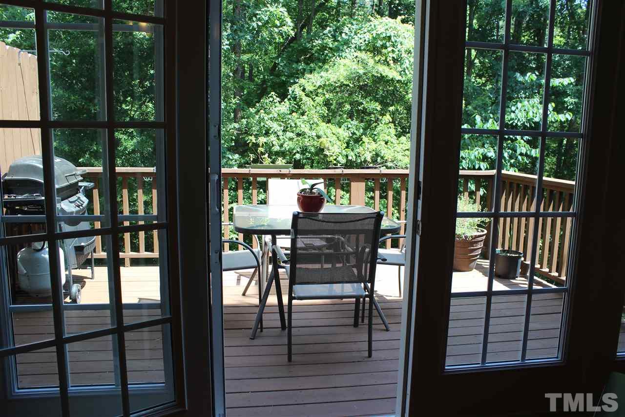2822 Pickett Road, Unit 169 Durham, NC 27705 - Photo 4 of 17 Relax and unwind on the large, private deck surrounded by lush greenery.