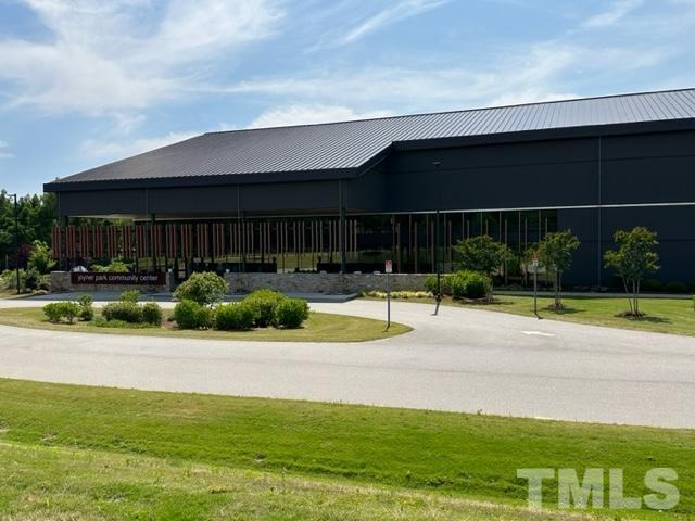 301 Devon Cliffs Drive Wake Forest, NC 27587 - Photo 26 of 26 a view of swimming pool in front of house