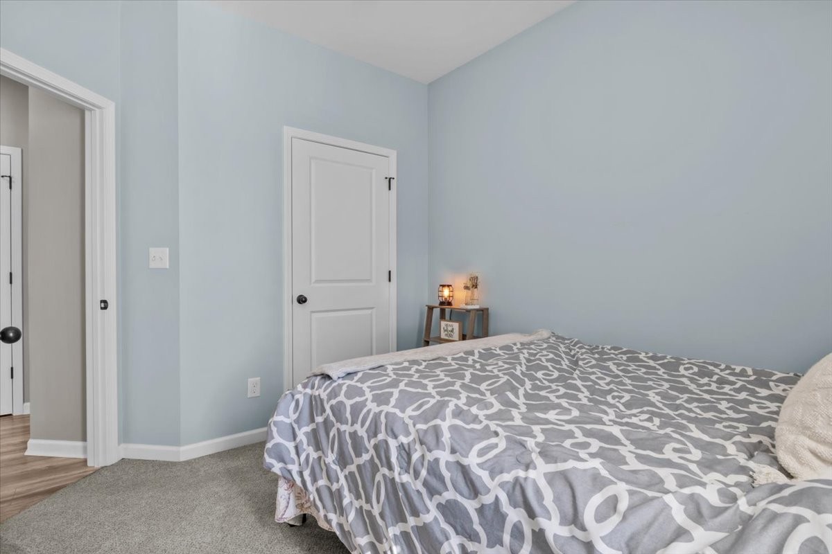 120 Pinethicket Road McEwen, TN 37101 - Photo 21 of 36 a bedroom with a bed and a window
