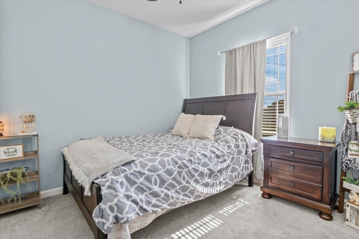 120 Pinethicket Road McEwen, TN 37101 - Photo 22 of 36 a bedroom with a bed and a window