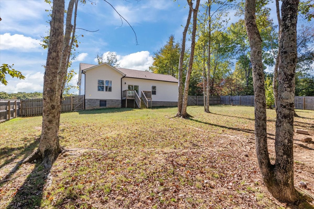 120 Pinethicket Road McEwen, TN 37101 - Photo 29 of 36 a view of a house with a yard covered in snow