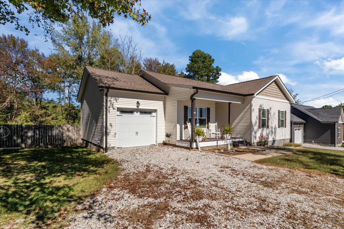 120 Pinethicket Road McEwen, TN 37101 - Photo 35 of 36 a front view of a house with garden