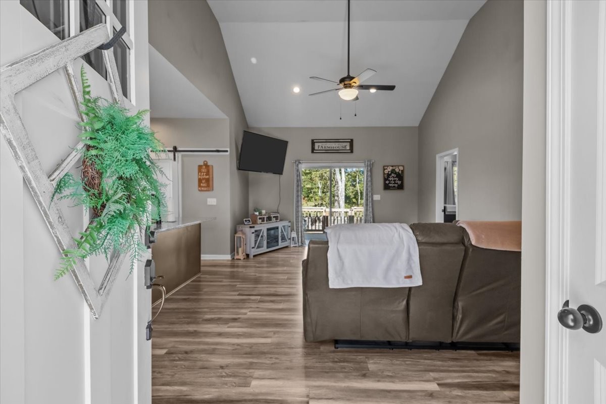 120 Pinethicket Road McEwen, TN 37101 - Photo 4 of 36 a living room with furniture and a chandelier