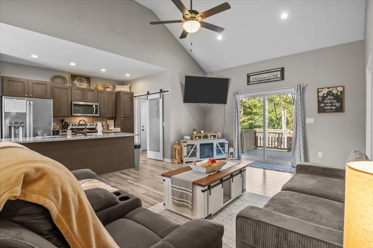 120 Pinethicket Road McEwen, TN 37101 - Photo 7 of 36 a living room with furniture and a large window