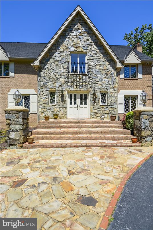 11100 Tara Road Potomac, MD 20854 - Photo 52 of 58 Stone and Brick front elevation
