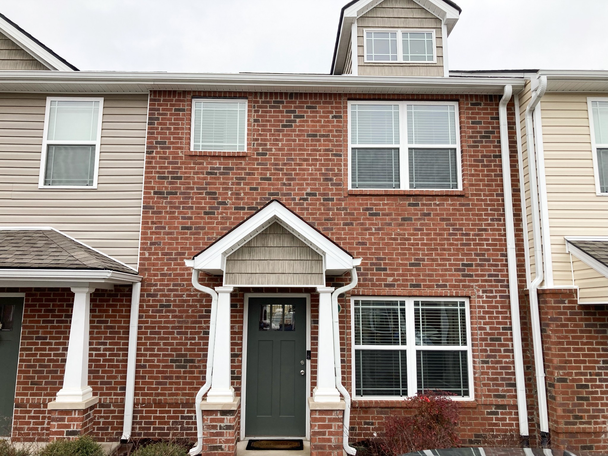 8011 Tuberose Court Spring Hill, TN 37174 - Photo 1 of 20 a front view of a house