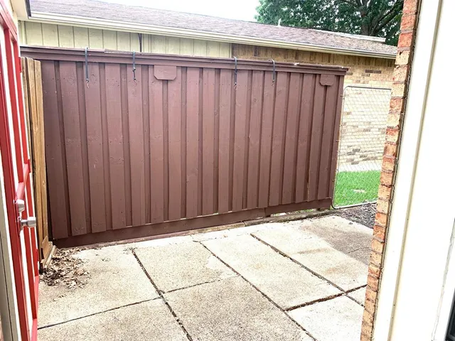 a view of wooden fence