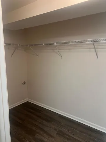 a view of a room with racks on the wall
