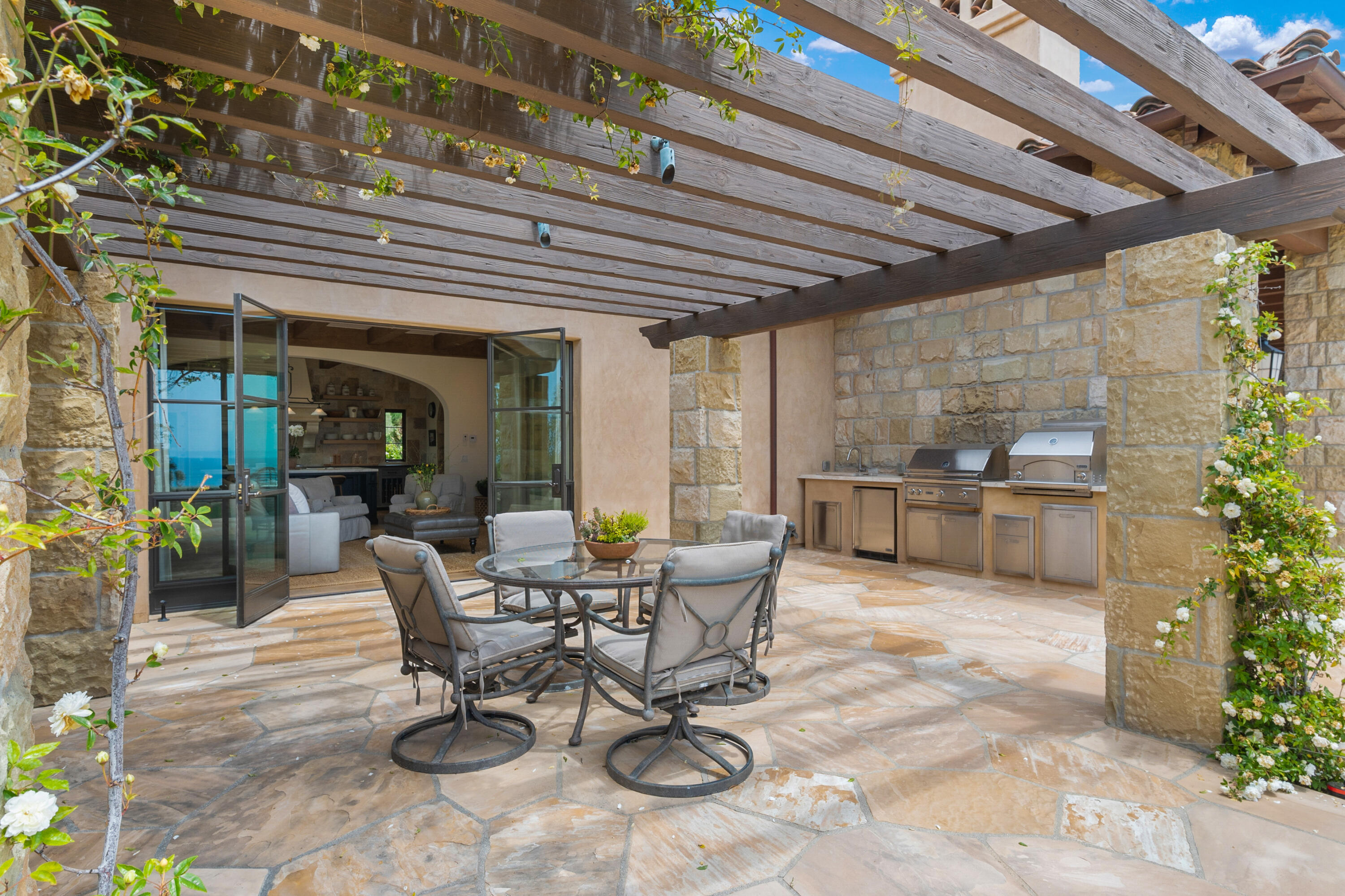 130 Montecito Ranch Lane Summerland, CA 93067 - Photo 18 of 33 a view of a dinning table and chairs in patio of the house