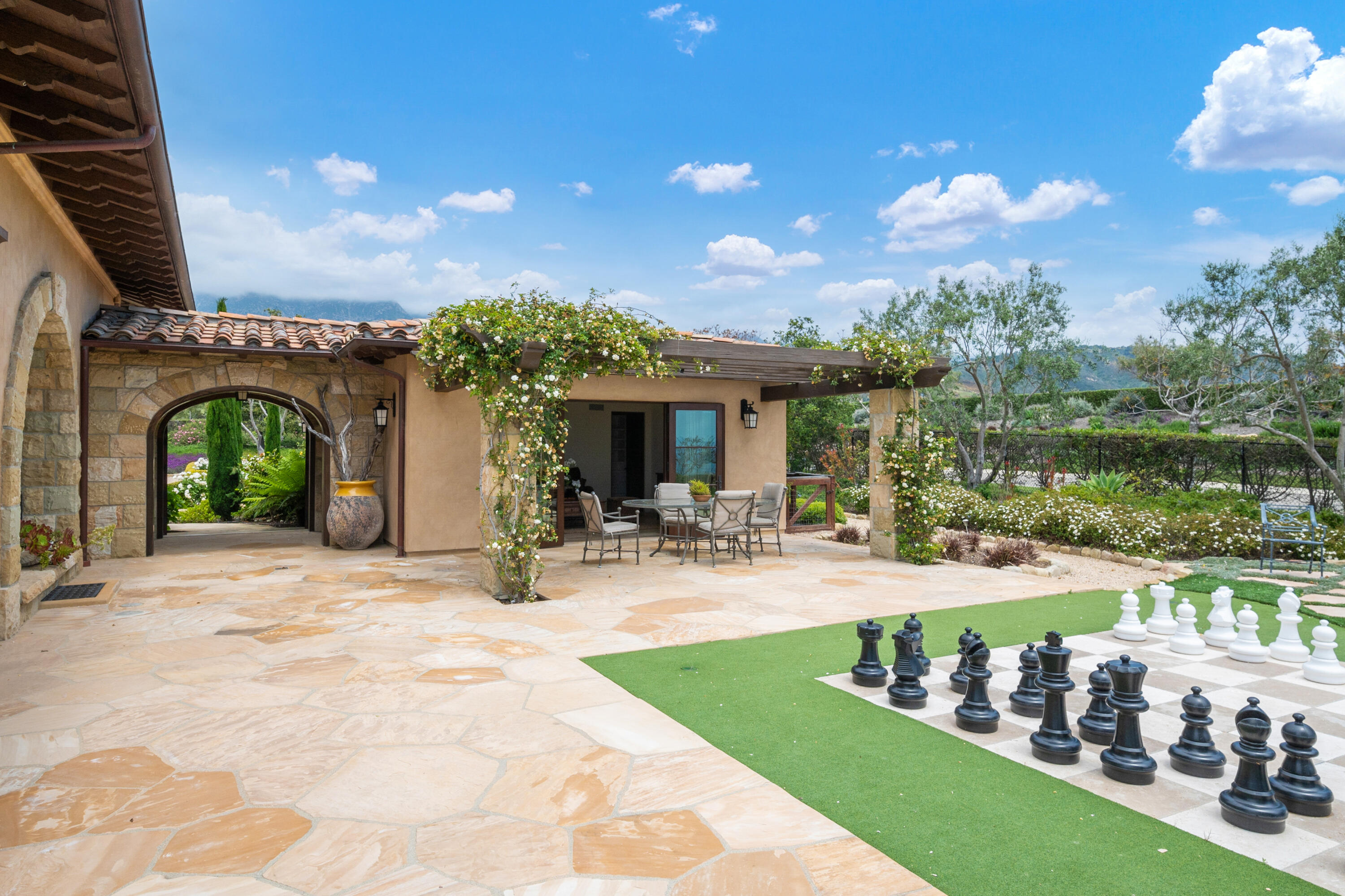 130 Montecito Ranch Lane Summerland, CA 93067 - Photo 19 of 33 a view of a house with porch and garden