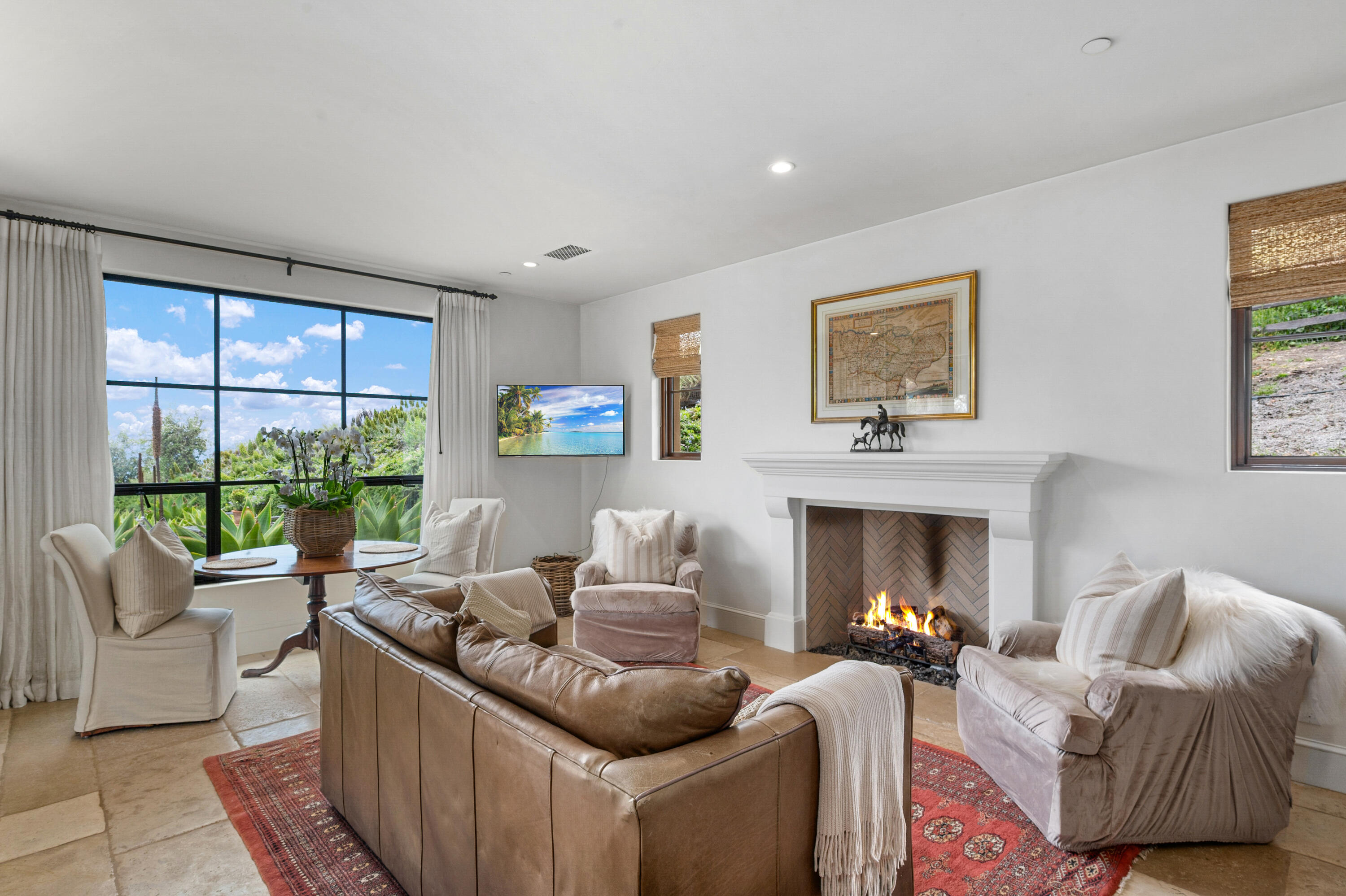 130 Montecito Ranch Lane Summerland, CA 93067 - Photo 22 of 33 a living room with furniture and a fireplace