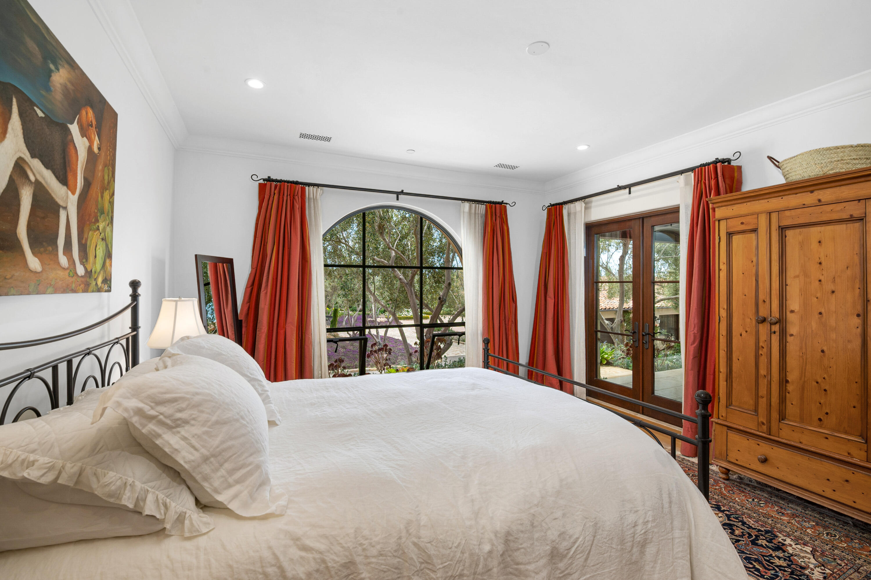 130 Montecito Ranch Lane Summerland, CA 93067 - Photo 23 of 33 a bedroom with a large bed and a window
